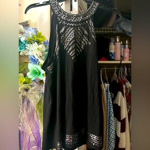 Gently used black with sequins size XL junior’s sleeveless top.
